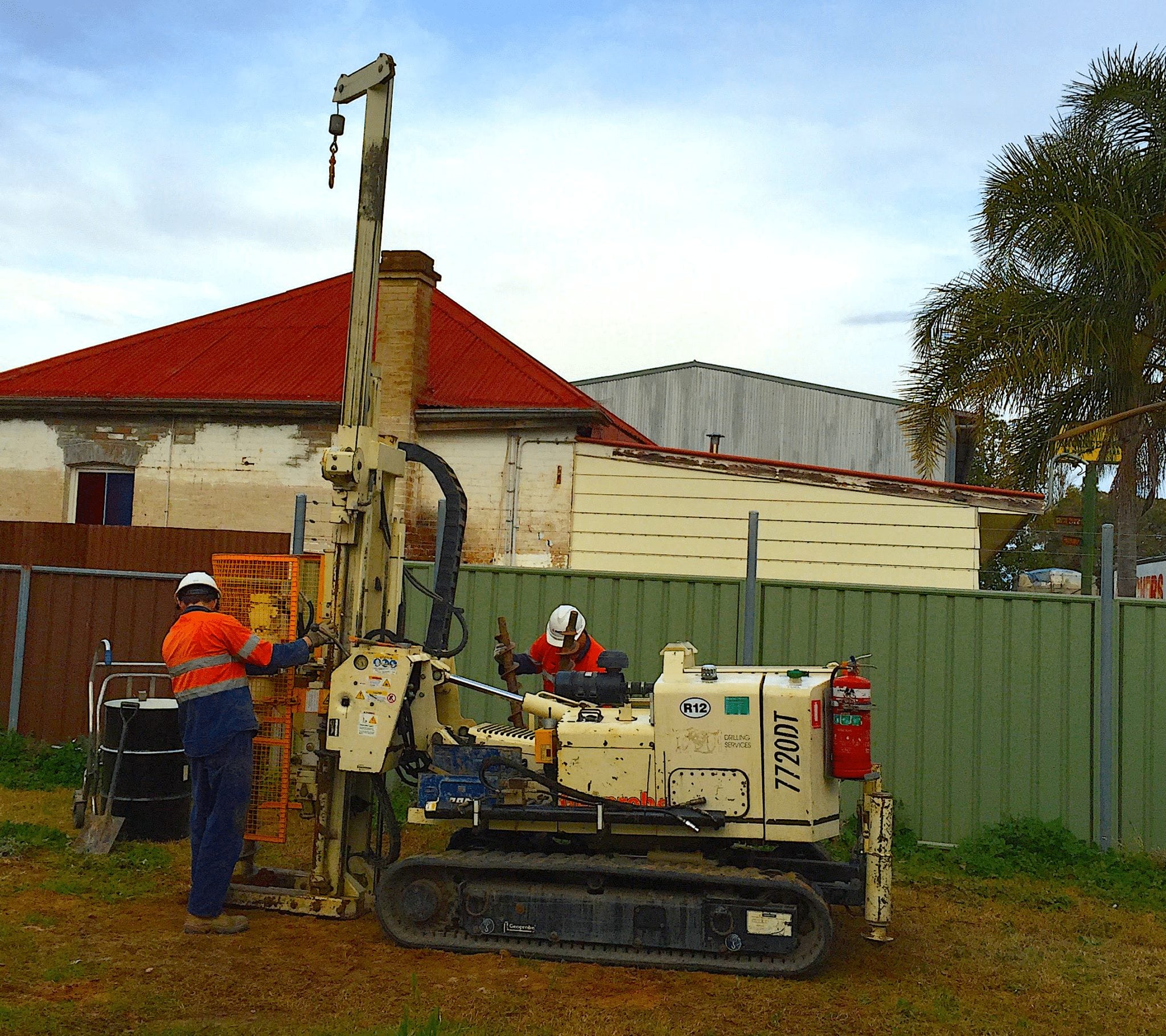 Direct-push drilling rig installing a groundwater monitoring well