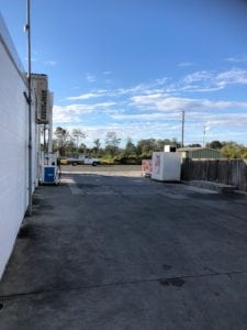 Side view of petrol station