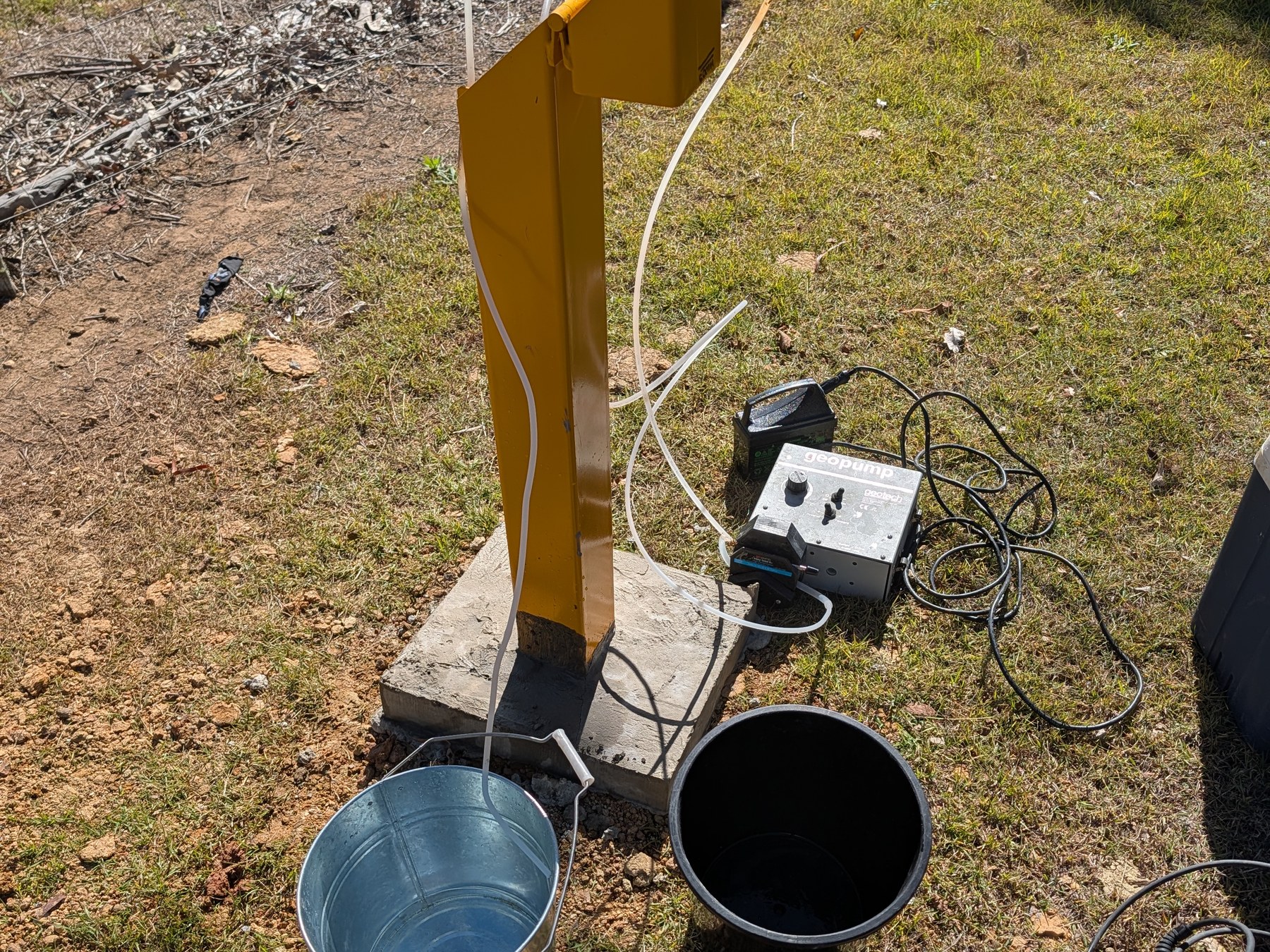 Groundwater monitoring well purge and sampling setup during UPSS investigation for EMR removal in Crows Nest Queensland Groundwater monitoring well purge and sampling setup during UPSS investigation for EMR removal in Crows Nest Queensland
