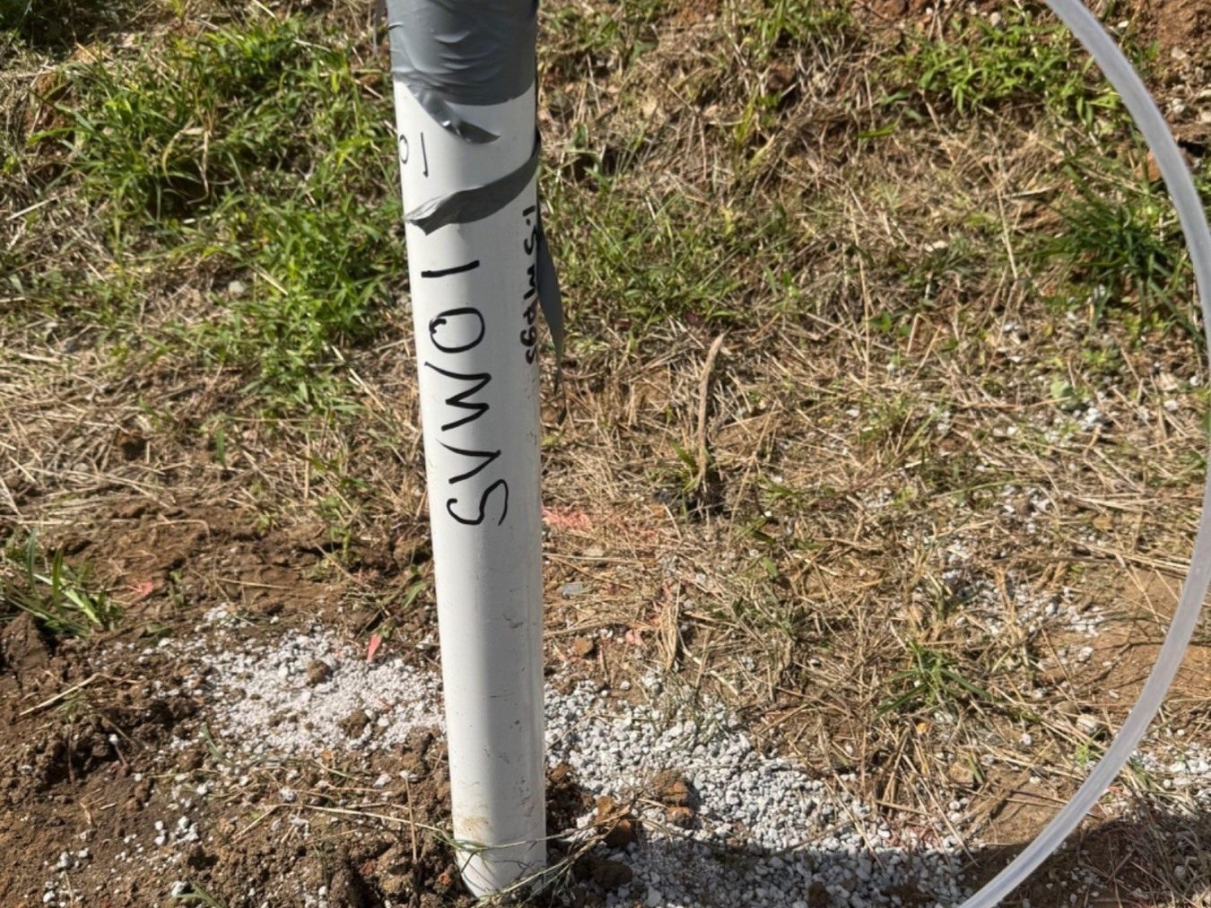 Soil vapour monitoring well with sampling tubing installed during a contaminated land investigation in Manly Queensland Soil vapour monitoring well with sampling tubing installed during a contaminated land investigation in Manly Queensland